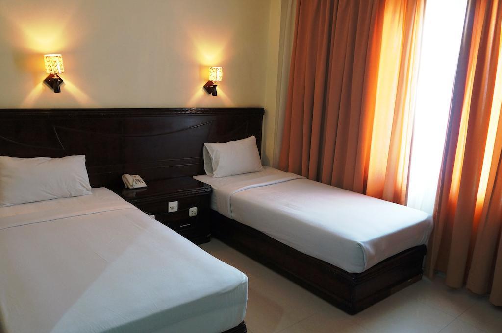 Edotel Minangkabau Padang  Habitación foto